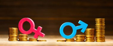 Bir yığın para ve cinsiyet sembolü, erkek ve kadın. Erkeklerin maaşı daha fazla.