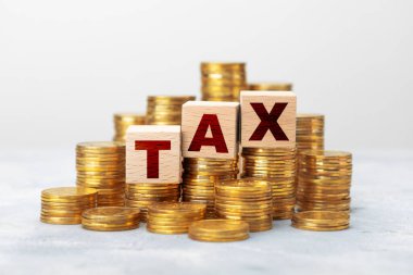 Vergi ve bir yığın altın.