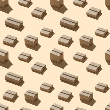 Karton kutular, sert gölgeler, kahverengi arkaplanda, geometrik, pürüzsüz desenler.