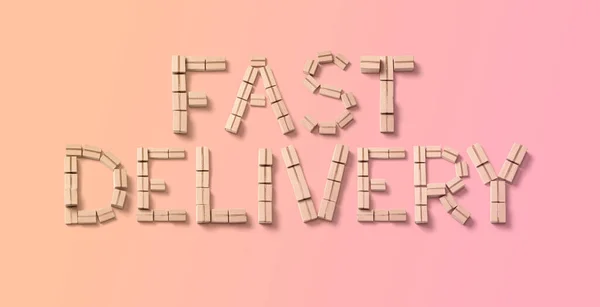 Fast delivery from cardboard boxes on a pink background — Stock Photo, Image