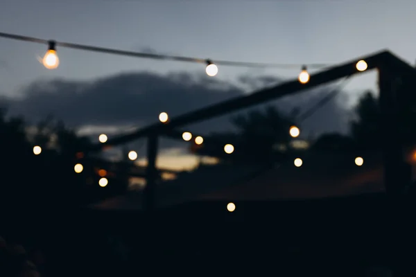 Decorative Outdoor String Lights Night Time Defocused Background Night City — Fotografia de Stock