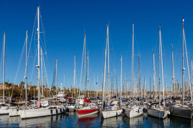 Barcelona (Catalonia, Spain) - January 6, 2022: View of the moored yachts in Port Vell harbor in the Catalan capital.