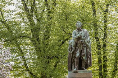 Statue of the famous swedish author Esajas Tegner in Lundagrd, Lund, Sweden, May 7, 2022