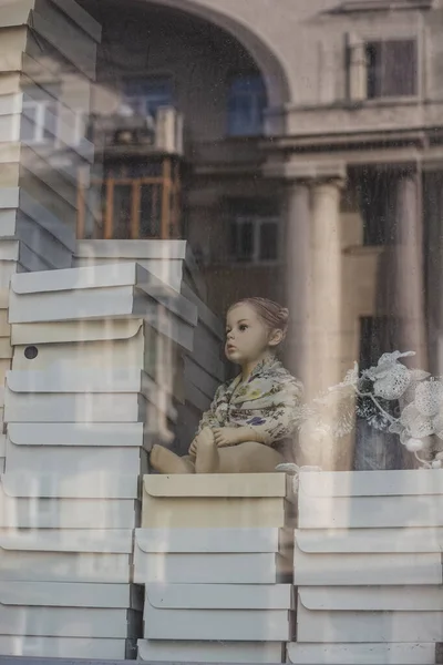 Doll Sits Boxes Looks Out Window — Stock Photo, Image