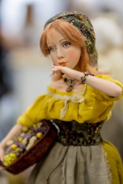 KIEV, Ukraine - September 06 ,2020: The doll looks like a real one. A simple peasant woman with a basket.