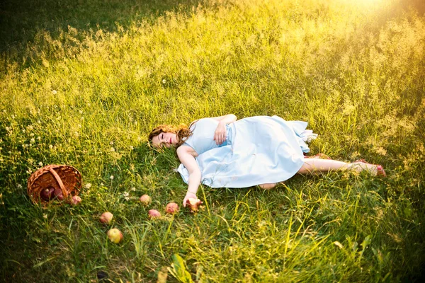 Girl Lies Scattered Apples — Stock Fotó