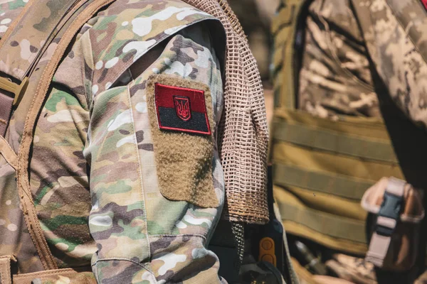 Chevron with the trident emblem on the sleeve of the Ukrainian military.