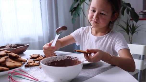 Little Cute Child Girl Decorates Gingerbread Cookies Holidays Home — Stock Video