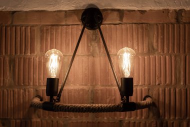 Retro light bulbs hanging in department store, with decorate interior luxury, fixtures combine beautiful modernity Designer, lamps on the ceiling