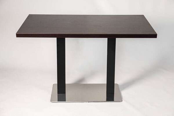 table with metallomit legs on a white background