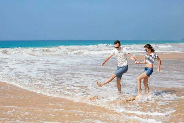 Portrait of lovely couple in love having fun on the beach. Young beautiful people hugging . Romantic moment. Valentine's day. Honey moon.