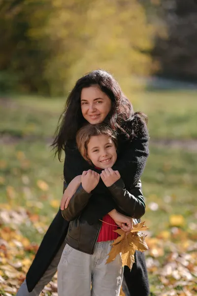 Mother Hugging Girl Autumnal Park Closeup Portrait — Stock Photo, Image