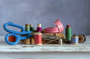 Still life with sewing accessories and a box. Vintage.