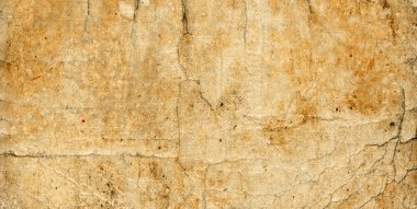 Old rough paper texture. Worn book cover. Old cardboard. Abstract background.