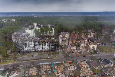The aerial view of the destroyed and burnt buildings. The buildings were destroyed by russian rockets and mines. The Ukrainian cities after the russian occupation.