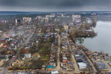 The aerial view of the destroyed and burnt buildings. The buildings were destroyed by russian rockets and mines. The Ukrainian cities after the russian occupation.