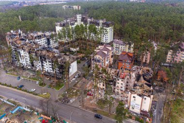 The aerial view of the destroyed and burnt buildings. The buildings were destroyed by russian rockets and mines. The Ukrainian cities after the russian occupation.