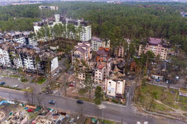 The aerial view of the destroyed and burnt buildings. The buildings were destroyed by russian rockets and mines. The Ukrainian cities after the russian occupation.