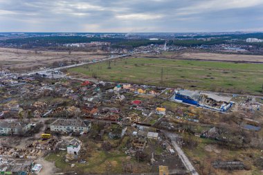 The aerial view of the destroyed and burnt buildings. The buildings were destroyed by russian rockets and mines. The Ukrainian cities after the russian occupation.