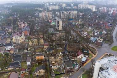 The aerial view of the destroyed and burnt buildings. The buildings were destroyed by russian rockets and mines. The Ukrainian cities after the russian occupation.