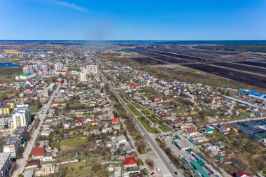 The aerial view of the destroyed and burnt buildings. The buildings were destroyed by russian rockets and mines. The Ukrainian cities after the russian occupation.