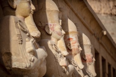 View of Hatshepsut's temple. Mortuary temple of the pharaoh of the Hatshepsut dynasty. Jeser-Jeseru is a masterpiece of ancient Egyptian architecture. The sanctuary is carved right into the rocks.