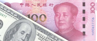 Çin Yuan 'ı ve Amerikan doları arka planda. Çin ve Amerika Birleşik Devletleri kağıt para birimleri. Ticaret ve ticaret kavramı