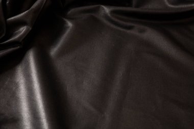 Siyah ipek arka plan lüks kumaş dokusu, saten kumaş dalga malzemesi, Noel soyut koyu arka plan, zarif parlak duvar kağıdı şablonu