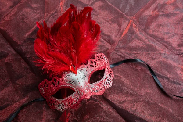 Carnival Venetian Mask Red Color Glitter Feathers Decoration Red Textile — Stock Photo, Image