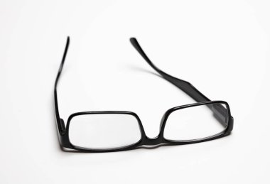 Eyeglasses or spectacles for vision correction. Myopia, presbyopia black frame eye glasses isolated cutout on white background.