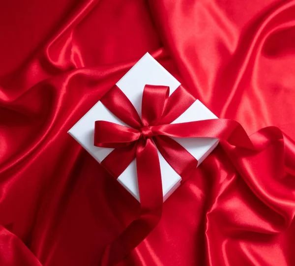 Gift Box White Red Ribbon Bow Satin Background Christmas Valentine — Stockfoto