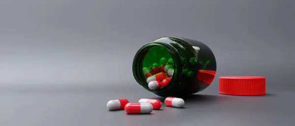 绿色瓶子里的胶囊散落在灰色的背景上 药物剂量和有红色盖子的玻璃容器 复制空间 3D渲染 — 图库照片