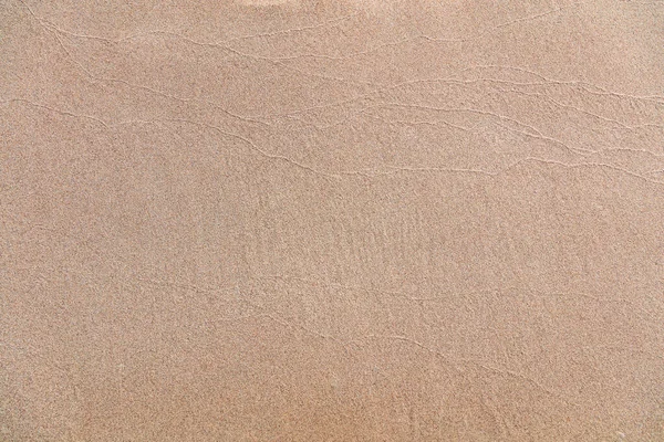 清澈的湿砂质背景 在希腊的桑迪海滩 近距离俯瞰风景 海水平整表面 复制空间 希腊岛屿 夏季假期 — 图库照片