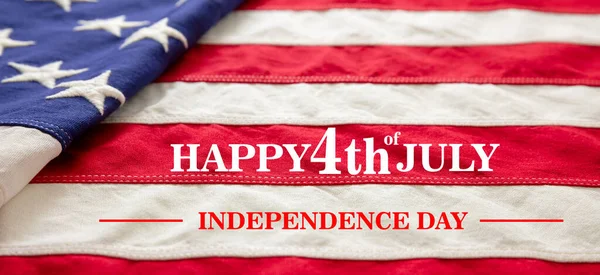 July fourth, HAPPY 4th of JULY, Independence day.Text on USA flag background. America National Holiday celebration.