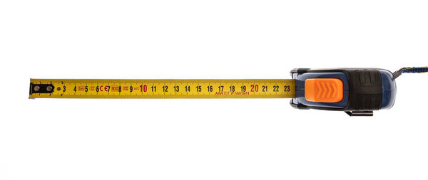 Tape measure metal isolated cut out on white background, overhead view. Yellow color steel ruler open 20 centimeter length