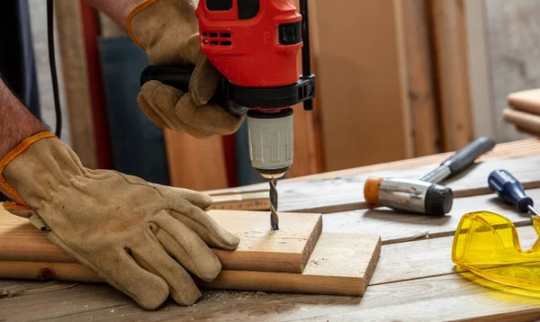 Drill Electric Tool Gloved Hand Drilling Wood Construction Industry Carpenter — Stock Photo, Image