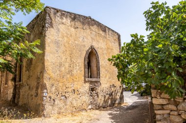 Kythera Kastro of Milopotamos Kato Chora Ionian islands, Greece. Monument at Kythira, abandoned building at old stonewall Venetian castle nature around. Greek sightseeing.