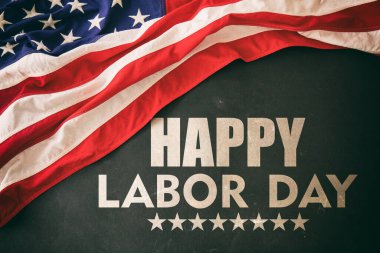 Happy Labor Day and USA Flag on black background, above view. US America holiday celebration