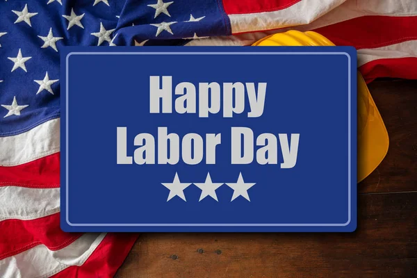 Happy Labor Day text, USA flag and construction tools. United States America holiday celebration