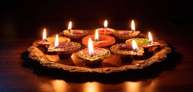 Diwali. Diya oil lamps lit at Deepavali celebration. Hindu Festival of lights India. Happy holiday greeting car