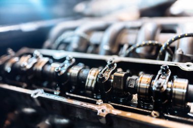 cylinder head repair, car engine camshaft repair.