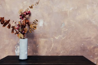 putty brown wall, artistic painting in vintage style.