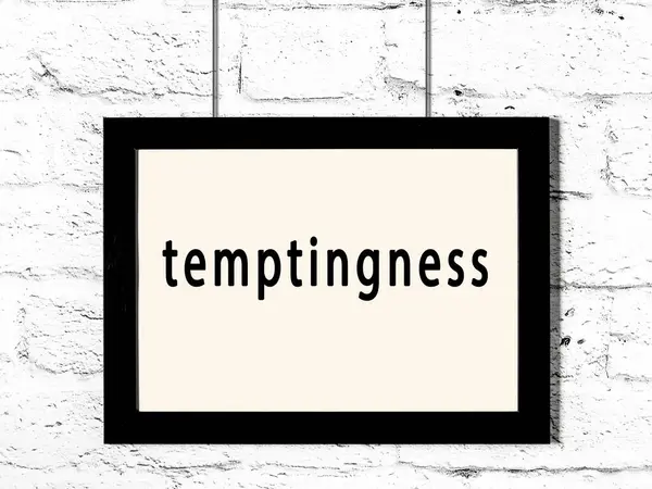 Μαύρο Ξύλινο Πλαίσιο Επιγραφή Temptingness Κρέμεται Λευκό Τοίχο Τούβλο — Φωτογραφία Αρχείου