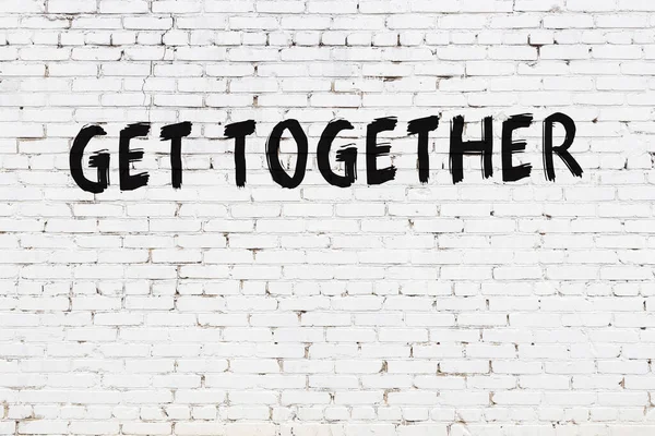 White Brick Wall Inscription Get Together Handwritten Black Paint — Stock Photo, Image