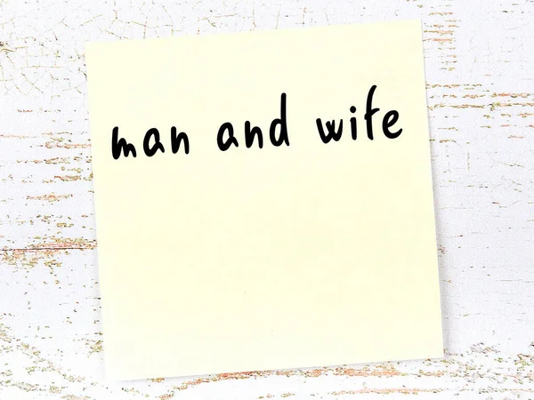 Concept Reminder Man Wife Yellow Sticky Sheet Paper Wooden Wall — Stock Photo, Image