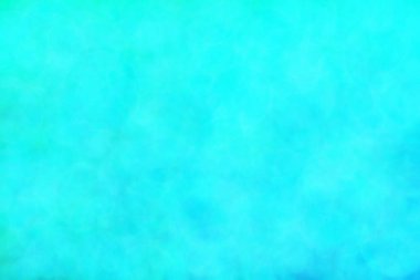 Bokeh ile soyut bir arkaplan. Yumuşak ışık odaklı noktalar.