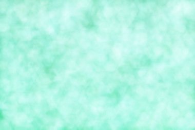 Soyut aquamarine renkli bokeh arkaplanı.