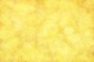 Altın soyut çözünmüş arkaplan, daire şeklinde bokeh desen.