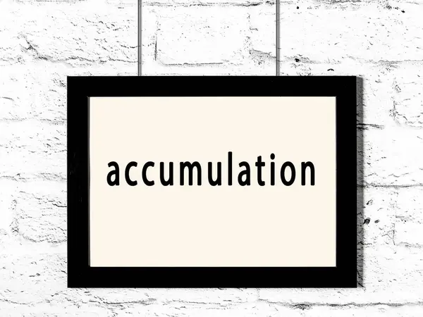 Black Wooden Frame Inscription Accumulation Hanging White Brick Wall — Stock Photo, Image