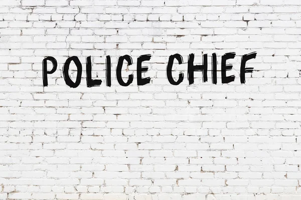 Надпись Начальник Полиции Написана Черной Краской Стене Белого Кирпича — стоковое фото